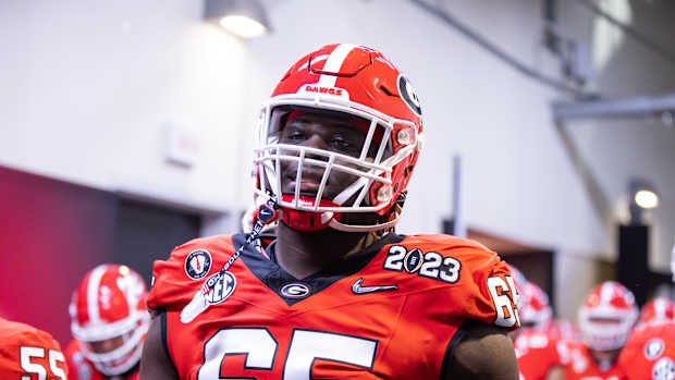 Jan 9, 2023; Inglewood, CA, USA; Georgia Bulldogs offensive lineman Amarius Mims (65) against the TCU Horned Frogs during the CFP national championship game at SoFi Stadium. Mandatory Credit: Mark J. Rebilas-USA TODAY Sports  